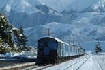 The TranzAlpine travels between Christchurch and Greymouth, from one coast of New Zealand to the other.