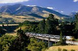 Travel by train from Picton to the 'Garden City' of Christchurch on the TranzCoastal railway.