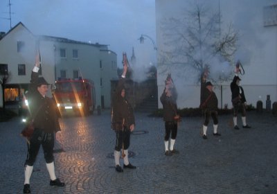 Traditional Bayern gun salute, outside the church in Marktl.