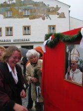 Women of Marktl provide the finishing touches to Benedict XVI tribute.